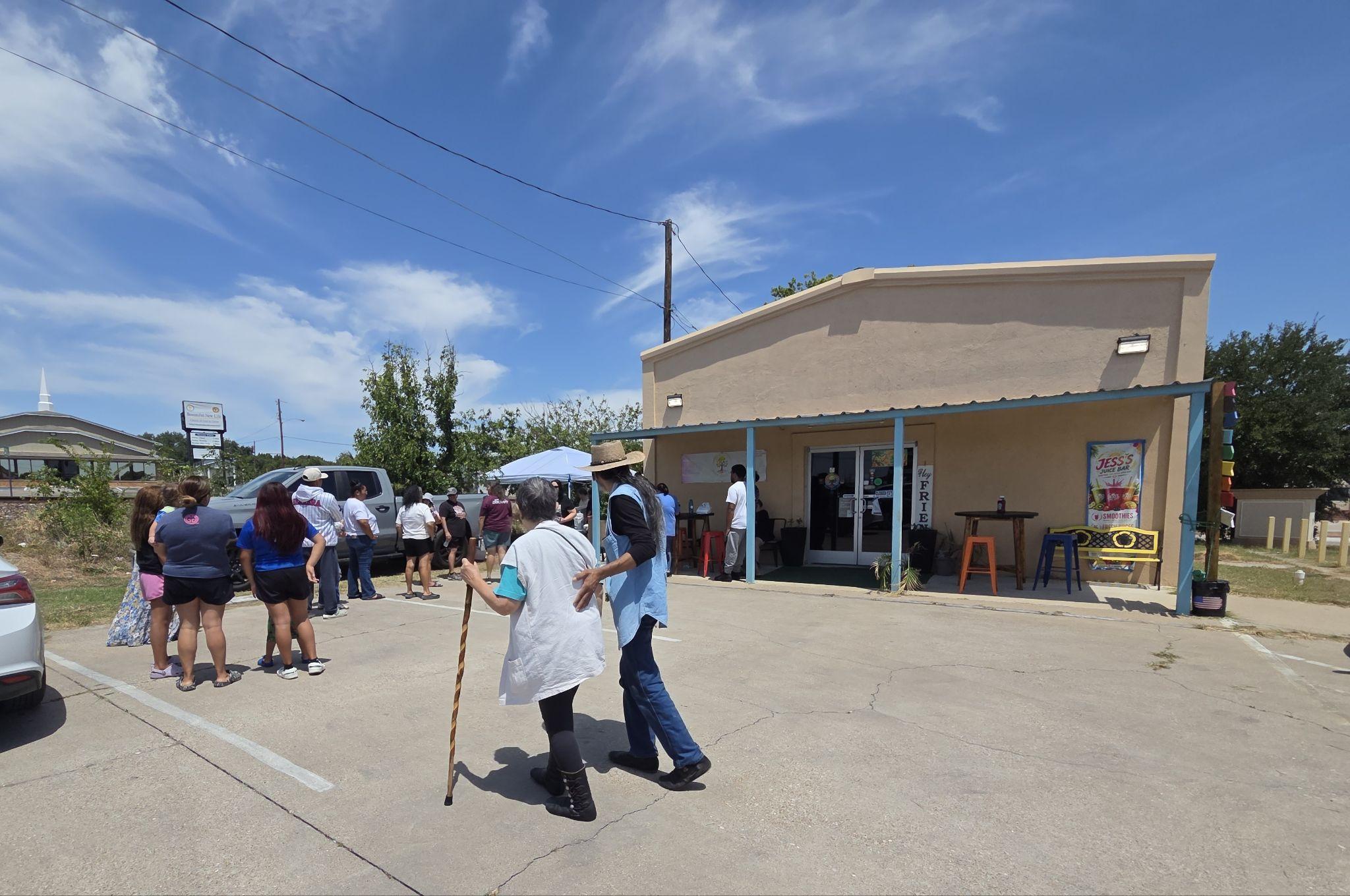 Copperas Cove residents line up to receive free food and water from local businesses amid water crisis.