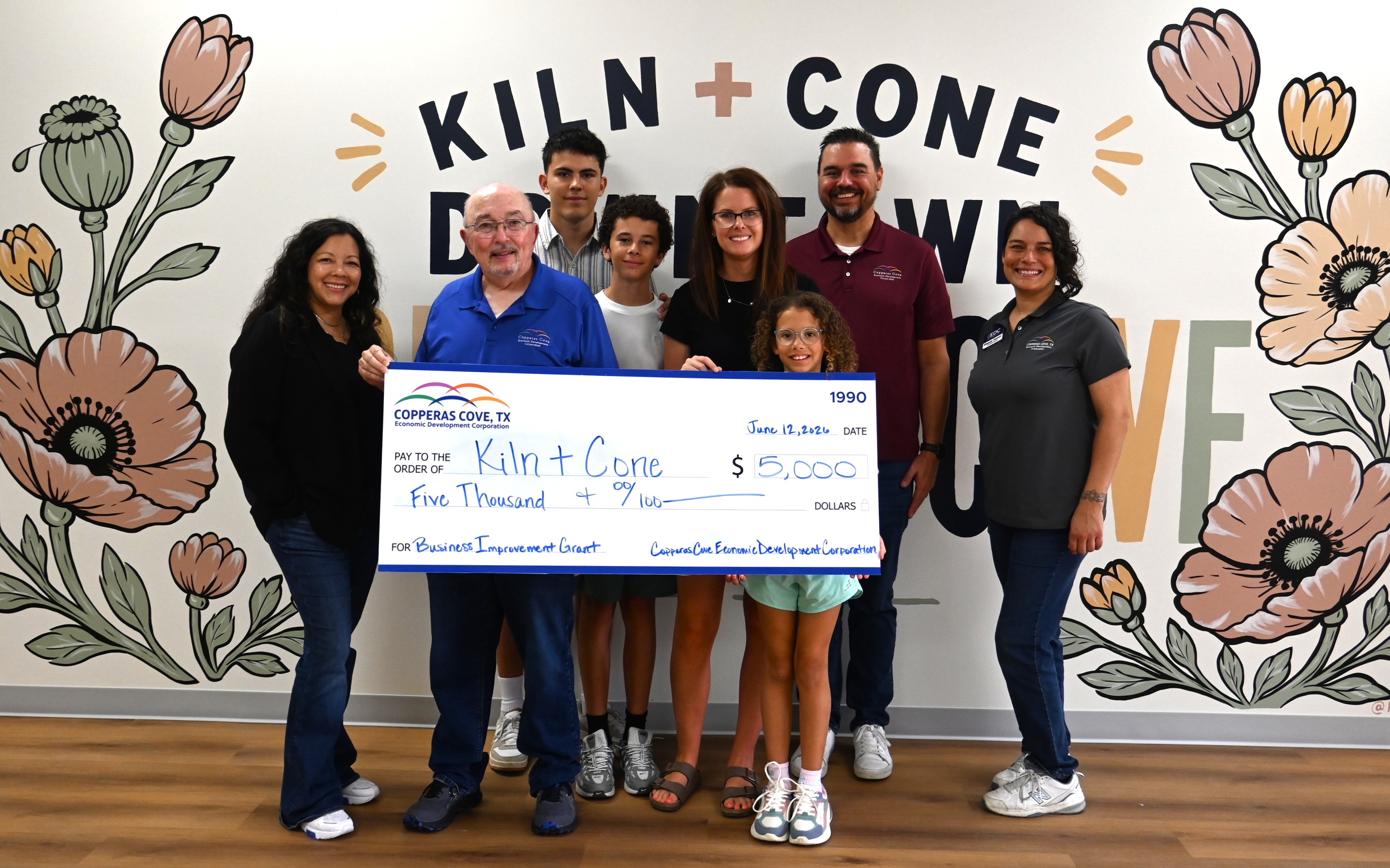Ashley Lyons, owner of Kiln + Cone, is pictured with the Copperas Cove EDC staff and a $5,000 grant check. The grant funds are matching funds that were used to renovate Kiln + Cone, set to open this summer in downtown Copperas Cove.. 