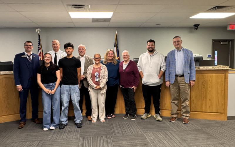 Students, Copperas Cove ISD representatives, along with City Manager Ryan Haverlah, Fire Chief Doug Matthijetz, and Mayor Dan D. Yancey gather for a photo after the Copperas Cove city council approved the donation of two out of commission ambulances to the Copperas Cove and Lampasas Independent School Districts.
