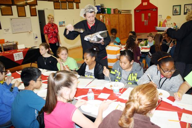 Courtesy Photo/CCISD Teriyaki Chicken got the highest marks from Martin Walker Elementary students in a taste testing of cafeteria foods as students gave their feedback to the CCISD Child Nutrition Department as to what items should be on next year’s school lunch menu. Many children had never used chopsticks before or tasted Asian cuisine. 