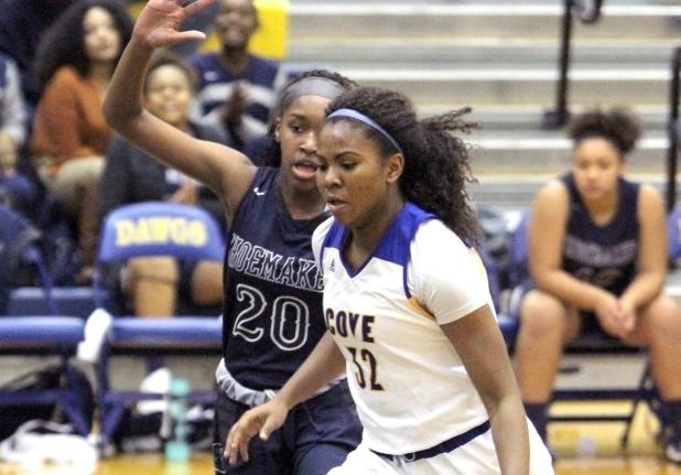Cove sophomore Oni Boodoo drives the lane against Shoemaker’s Zaiah Jackson during the Lady Dawgs’ 47-44 loss to the Lady Wolves Tuesday at Bulldawg Gymnasium. Boodoo led the Lady Dawgs with 12 points and four assists.