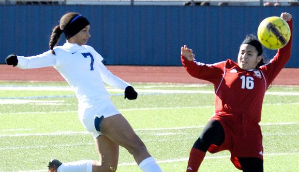 Cove’s Haven Stevenson takes a shot on goal during the Lady Dawgs’ 2-1 win over Manor Saturday at Bulldawg Stadium. Stevenson scored both goals for Cove.