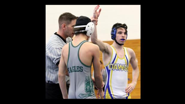 CCLP/TJ MAXWELL Copperas Cove senior Lane Teeter has his hand raised after winning his thirdstraight district championship during the District 13-6A werstling meet held Saturday at Shoemaker High School.
