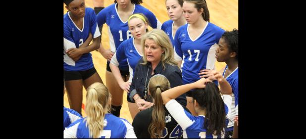 FILE PHOTO - Copperas Cove head coach Cari Lowery talks to her team during their district contest at Waco Midway last year. Lowery and the Lady Dawgs are looking for their 10th-consecutive year in the state rankings and state playoffs and Lowery is looking to collect her 700th win as a coach.