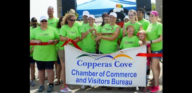 CCLP/LYNETTE SOWELL - Juile Moser and Jen Reynolds cut the ribbon for Pink Warrior Angels on Saturday.