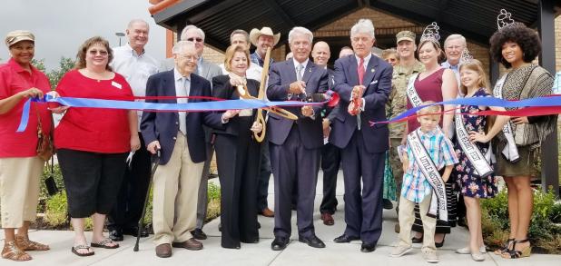 CCLP/PAMELA GRANT - Chairman of the CTC Board of Trustees Mari Meyer, CTC Chancellor Jim Yeonopulus, and Congressman Roger Williams cut the ribbon for the renovated Criminal Justice/Protective Services.