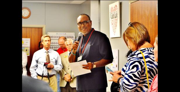 CCLP/LYNETTE SOWELL - Carlyle Walton, president and CEO of Metroplex Health System, says a few words at the ribbon cutting and open house for Metroplex’s newly renovated and expanded heart and vascular center on Thursday.