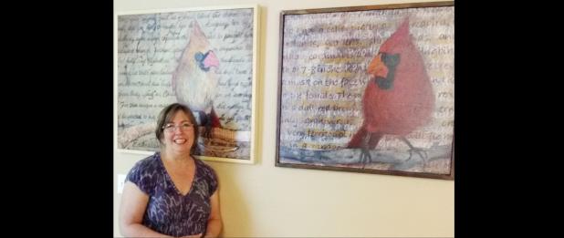 Courtesy photo - Linda Lapierre stands beside two of her paintings which were recently on display at the Copperas Cove Entrepreneur Center. Lapierre is showing her work at Frames & Things’ monthly First Friday Art After Dark this Friday from 6-9 p.m.