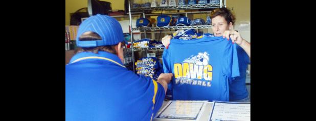 CCLP/LYNETTE SOWELL - The Quarterback Club has launched their new licensed Bulldawg wear for the 2016 Bulldawgs season. The apparel can be purchased at the Quarterback Club concession stand or at the club’s weekly meetings at Lil Tex Restaurant every Wednesday.