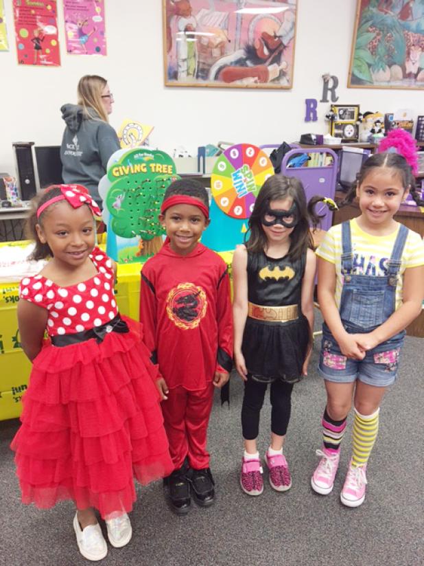 Courtesy Photo/CCISD Hettie Halstead Elementary students Kaylah Hill, Jayvyon Adams, Annabelle Williams, and Mia Carreon dress as their favorite book characters during Children’s Book Week. The event is one of many the school does to encourage children to keep reading.