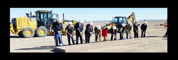 CCLP/CHUCK TAYLOR - Dignitaries turn the first shovels of dirt at a groundbreaking ceremony on Fort Hood Thursday afternoon.