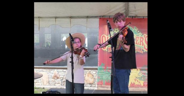 Courtesy Photo - Chet and Kaya Fagerstrom, the Twin Fiddle Kids, will perform at Pearl’s bluegrass music festival.