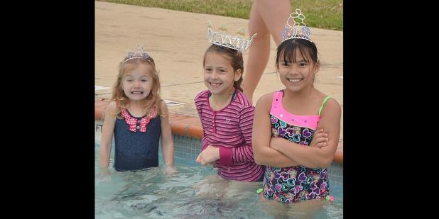 File Photo - 2014 Rabbit Fest Royalty braves the water during last years swim.