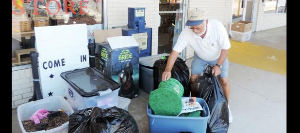 Courtesy Photo - On July 22, Copperas Cove Optimist International Club President Sandor Vegh sorts donations given to the Optimist Club Secondhand Store. The not-for-profit thrift store provides various resources and funding to families of children with severe health concerns, children’s hospitals, families with severe hardships, local organizations that serve the community and more.