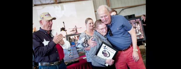 CCLP/DAVID MORRIS - Bill Kliewer hugs Eula “Sis” Beck after presenting her with the inaugural Pierre de Wet award for her selfless service to the soldiers of Fort Hood and it’s surrounding communities.