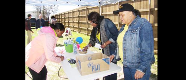 CCLP/PAMELA GRANT - Thanks For The Little Things, Inc (TFTLT) held a Donate & Receive event on Saturday. Donors were invited to write their names on decorative paper which will later be displayed.