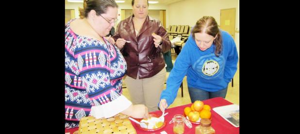 CCLP/ PAMELA GRANT - Participants in Taura Pool’s medieval marmalade class try samples of Pool’s quince, peach, and apple marmalades.