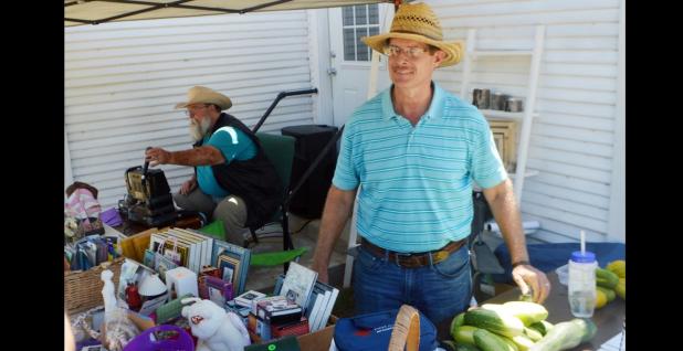 CCLP/LYNETTE SOWELL - David Kerney, pastor of Refuge Ministries Topsey Campus, stands under the canopy during the church’s monthly trade day on Saturday. The church, located about nine miles west of Copperas Cove near the intersection of F.M. 1113 and F.M. 580, holds a monthly trade day with free spots for vendors the fourth Saturday each month.