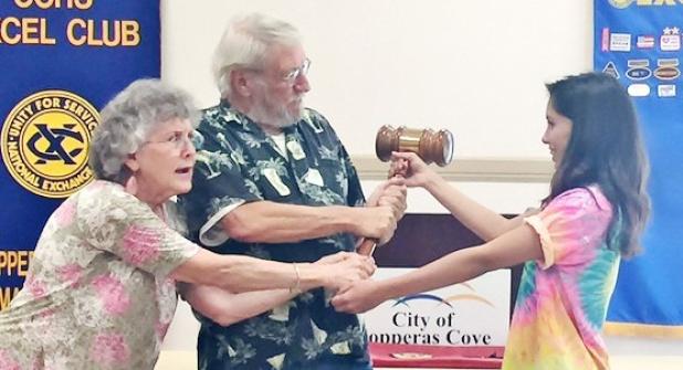 Courtesy Photo - Laura White and Pete Weston from the Gatesville Exchange Club receive the Travel Gavel from Taylor Flores, president of the Copperas Cove Excel Club.