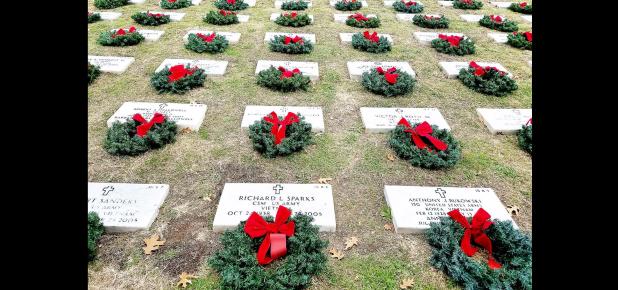 CCLP/PAMELA GRANT - Thousands showed up to lay wreaths honoring veterans at the Central Texas State Veterans Cemetery on Saturday.