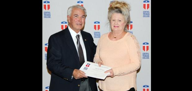 Courtesy Photo - Terri O’Connor of Copperas Cove receives her 35year service award from Jim Yeonopolus, Central Texas College chancellor.