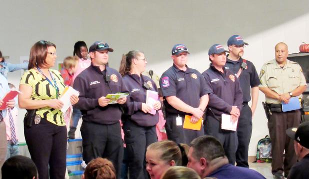 CCLP/BRITTANY FHOLER - First responders are recognized at the First Responders Appreciation concert held in the Fairview-Miss Jewell Elementary School cafeteria Thursday evening.