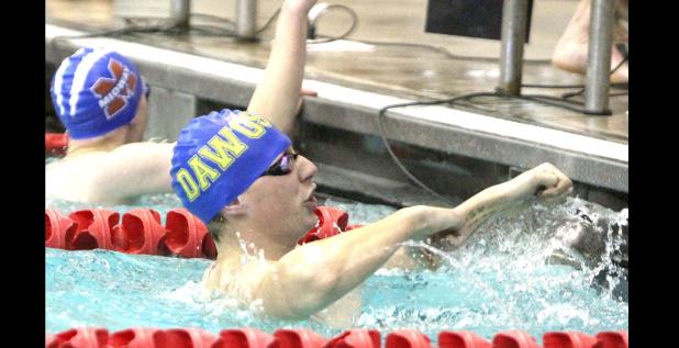 CCLP/TJ MAXWELL - Copperas Cove junior Carson McVeigh celebrates after winning the 50-yard freestyle race during the District 10-6A Swimming and Diving Championships Saturday at the Clements Boys and Girls Club.