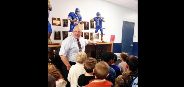 COURTESY PHOTO - CCISD Athletic Director Jack Welch greets second grade gifted education students and takes them through the hall of fame in the athletic annex. Students were visiting with athletic trainers to learn about the importance of movement to their overall health.