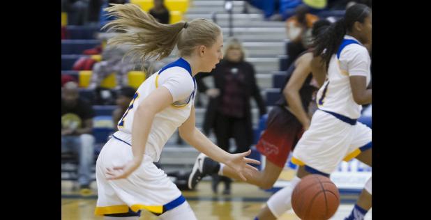 CCLP/TJ MAXWELL - Cove sophomore Madison Griffon drives during the Lady Dawgs’ 70-38 win over Manor on Friday.