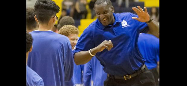 CCLP/TJ MAXWELL - Copperas Cove head basketball coach Billy White Jr. participates in pre-game festivities with his team before their home opener against Cedar Park. White was recently inducted into the St. Mary’s University Athletics Hall of Fame (San Antonio) for his career spanning 2001-2005.