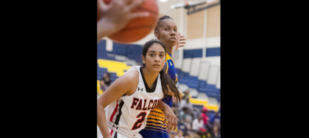 CCLP/TJ MAXWELL - Cove junior Erica Powell awaits the inbounds pass as San Antonio Stevens’ Cyrenna Rodriguez defends during the Lady Dawgs’ 44-41 win over the Lady Falcons on Friday.
