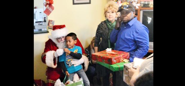 CCLP/LYNETTE SOWELL - On Thursday, the Copperas Cove Soup Kitchen was the setting of a visit from Santa Claus along with a gift distribution to local children in need. More than 60 children were given gifts this year via the gift drive headed up by soup kitchen director, Patrick Richardson.