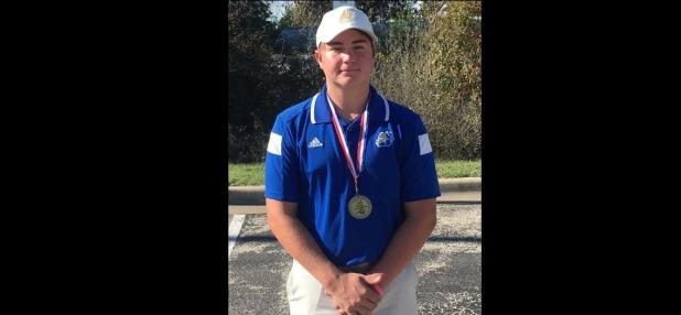 Courtesy photo - Cove senior Caden McAnally poses with his 1stplace medal after shooting a 77 to win the Killeen ISD Invitational on Thrsday.