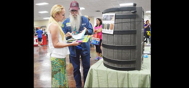 CCLP/FILE - Eco Harvest has interactive, hands-on exhibits along with information to show how to live more environmentally friendly.