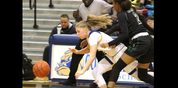 CCLP/TJ MAXWELL - Copperas Cove sophomore Madison Griffon falls to the floor after colliding with Ellison defenders Dalia Planas (2) and Madison Hattix-Covington in the third quarter of the Lady Dawgs’ 52-45 loss to the Lady Eagles Friday at Bulldawg Gymnasium.