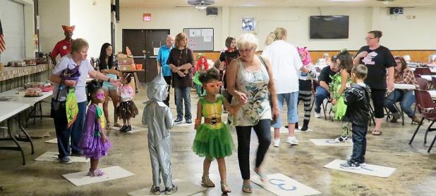 CCLP/DAVID J. HARDIN - Kids play a game for prizes during the VFW fall festival which was sponsored by the VFW and VFW Auxiliary on Saturday at the VFW Post 8577.
