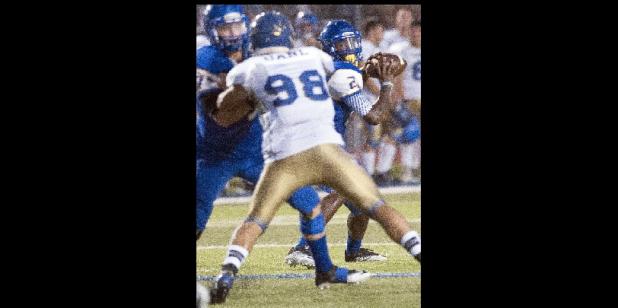 CCLP/DAVID MORRIS - Copperas Cove senior quarterback Caine Garner looks for a receiver in the first half of the Dawgs 27-14 win over Mexico’s Tigres De La Universidad Autónoma De Nuevo León Friday night at Bulldawg Stadium. The Dawgs host El Paso Franklin this Friday nigth.