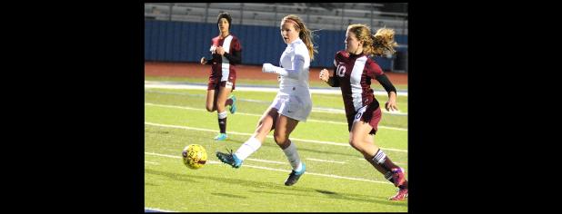 CCLP/LEE LETZER - Cove senior Ali McBride takes a shot on goal during the Lady Dawgs 0-0 tie with Killeen.