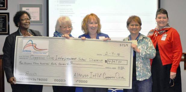 CCLP/Courtesy Photo - Members of Altrusa present a check for $4,347 to the Copperas Cove Independent School District to purchase books for first, second and third grade students. The presentation was made at last week’s CCISD board of trustees meeting.
