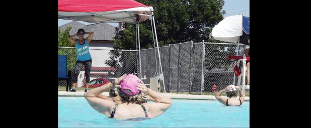 CCLP/PAMELA GRANT - Aqua Zumba Instructor Jeannette Valentine leads her class through a variety of aerobic exercises.