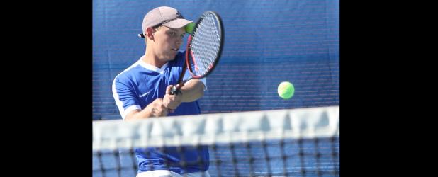 CCLP file photo - Cove senior Brett Alber hits a backhand during the team tennis playoffs in October. Alber and doubles teammate Nick Motley won a silver medal at the Rocket Invitational in Waco last Friday.