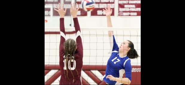 CCLP/ TJ MAXWELL - Copperas Cove senior Brianna Acker hit for a kill against Killeen’s Rhepsey Wyman during the Lady Dawgs’ 3-1 win (25-18, 25-23, 21-25, 25-11) over the Lady Roos on Tuesday in Killeen.