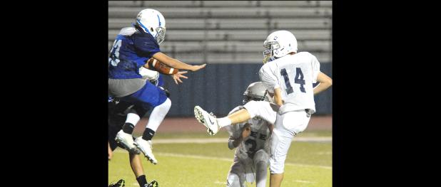 CCLP/TJ MAXWELL - Copperas Cove Junior High’s Chandler Gastelo blocks a SC Lee field goal attempt during the 7A battle for bragging rights Wednesday at Bulldawg Stadium. Cove Junior High swept the 7th grade games with the ‘B’ team winning 12-6 and the ‘A’ team edging out an 18-12 win.