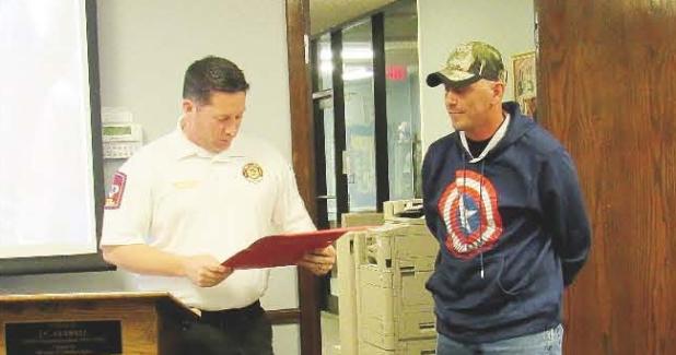 CCLP/BRITTANY FHOLER - Copperas Cove Fire Department Chief Michael Neujahr recognized CCISD Maintenance Department employee Raymond Riddle, at Tuesday’s Board of Trustees meeting, for his efforts in extinguishing a fire in the yard of a residence on the bus route last Thursday.