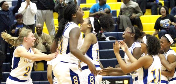 CCLP/TJ MAXWELL - The Copperas Cove Lady Dawgs celebrate after rallying from 18 points down in the fourth quarter to win 50-48 over the visiting Shoemaker Lady Wolves on Tuesday. The Lady Dawgs improve to 20-8, 3-3 in 12-6A.
