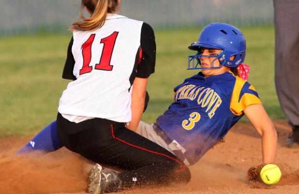 Copperas Cove’s Eliana Doubleday slides in to second base in front of Harker Heights’ Destiny Perry in the first inning of their 18-2 blowout of Harker Heights on Friday