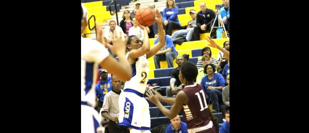 CCLP/TJ MAXWELL - Cove senior Keturah Taylor buries a three-pointer during the No. 14 Lady Dawgs’ 57-54 loss to the No. 9 Killeen Lady Roos on Tuesday. The Lady Dawgs travel to Belton tonight to face the Lady Tigers.