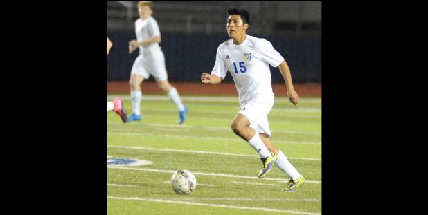 CCLP/LEE LETZER - Cove’s Jose Chavez drives down field during the Bulldawgs’ 4-1 win over Shoemaker last Friday. Chavez scored two goals in the win. The Bulldawgs host Killeen to open the second half of district action tonight at 7:30 p.m.