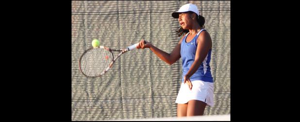 CCLP/TJ MAXWELL - Cove’s Latoya Alokoa hits a forehand during district play. Alokoa and doubles teammate Abby Mackwelung earned a straight-set win over Belton’s Kenzie Daniell/Erin McGoldrick 6-4, 7-6(2) during during Tuesday’ 14-5 loss to the Tigers.