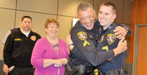 CCLP/LYNETTE SOWELL - Cpl. Corey Schmidt hugs newly-promoted Cpl. Cyle Brewer in the reception line after Brewer’s promotion ceremony on Friday afternoon.